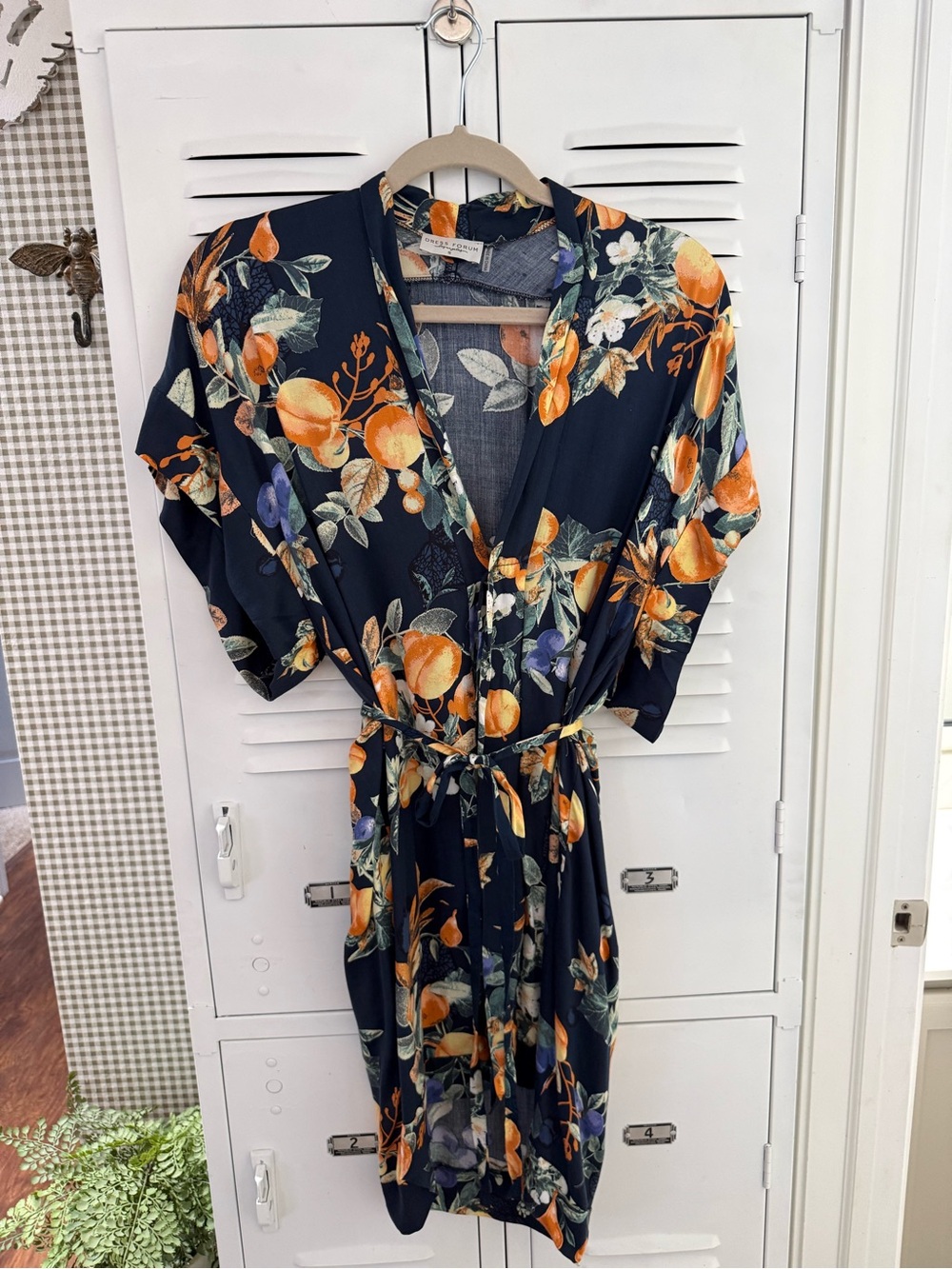 Dress Forum Navy Midi Wrap Dress with Orange Floral Print